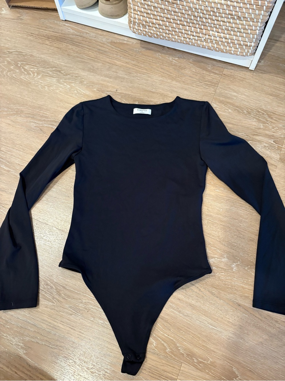 Babaton Black Long Sleeve One-Piece Bodysuit